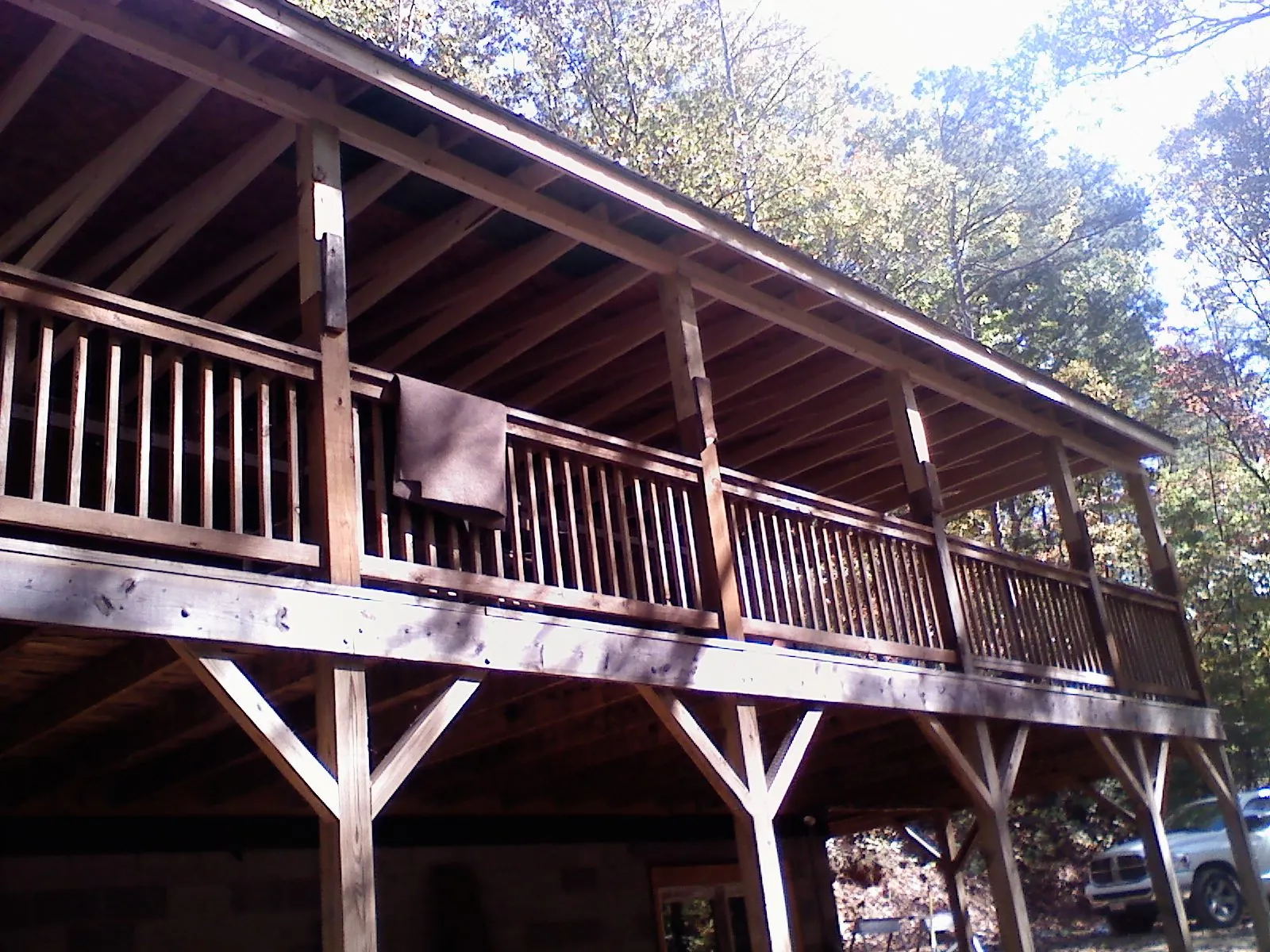 Timber framing under a new elevated porch and deck — Roof Leak Repair in Center Junction by Roofing Brothers